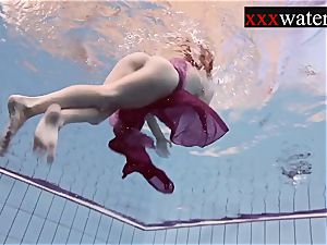 Smoking molten Russian redhead in the pool